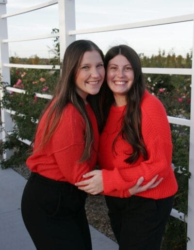 Alpha Phi director of Philanthropy Eliana Livingston and Vice President of Diversity, Equity and Inclusion Macie Farber pose for a picture together.