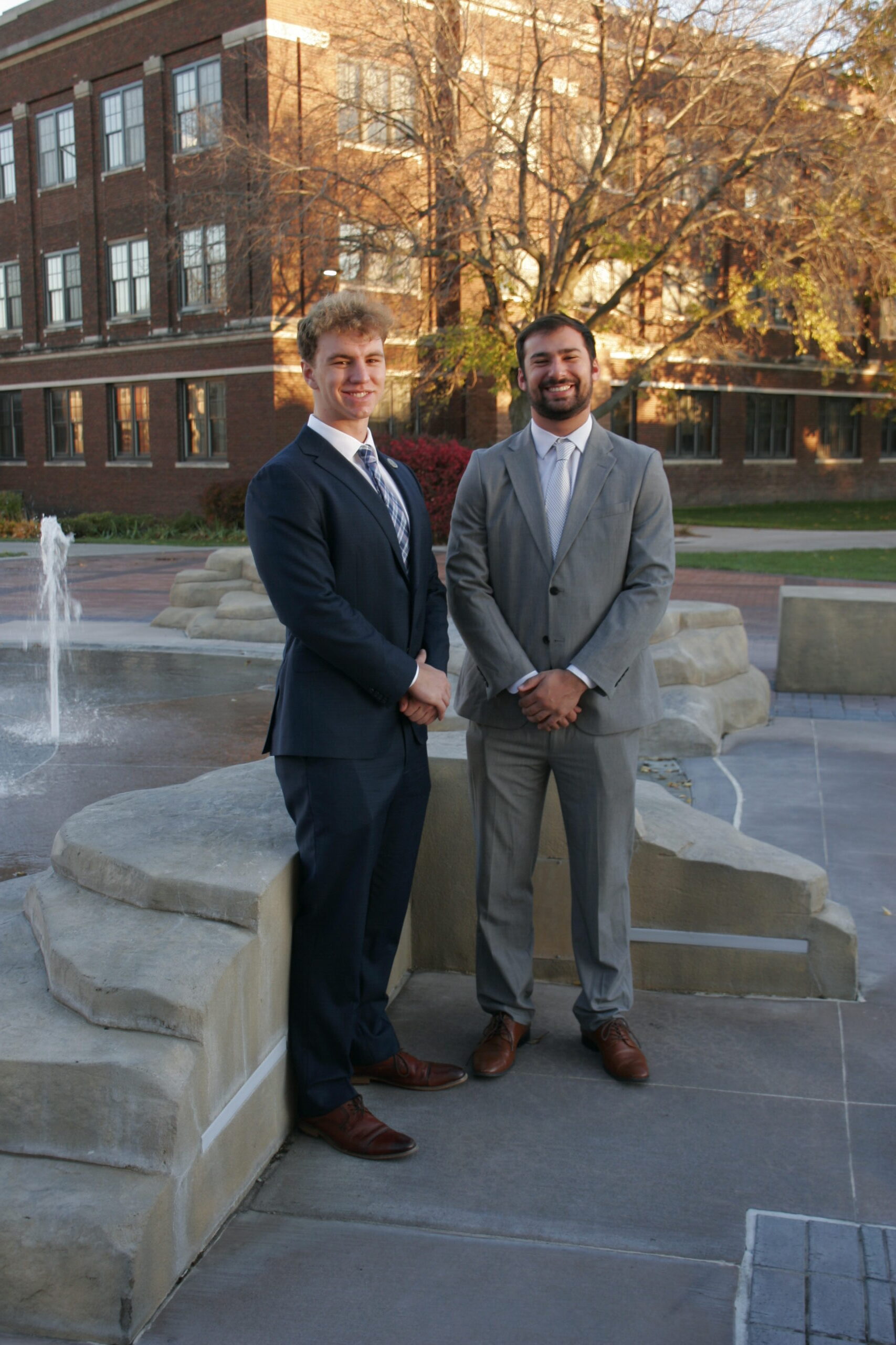 _MG_9408 UNK Student body president Sam Schroeder and vice president Zane Grizzle pose for a photo outside the fountain.