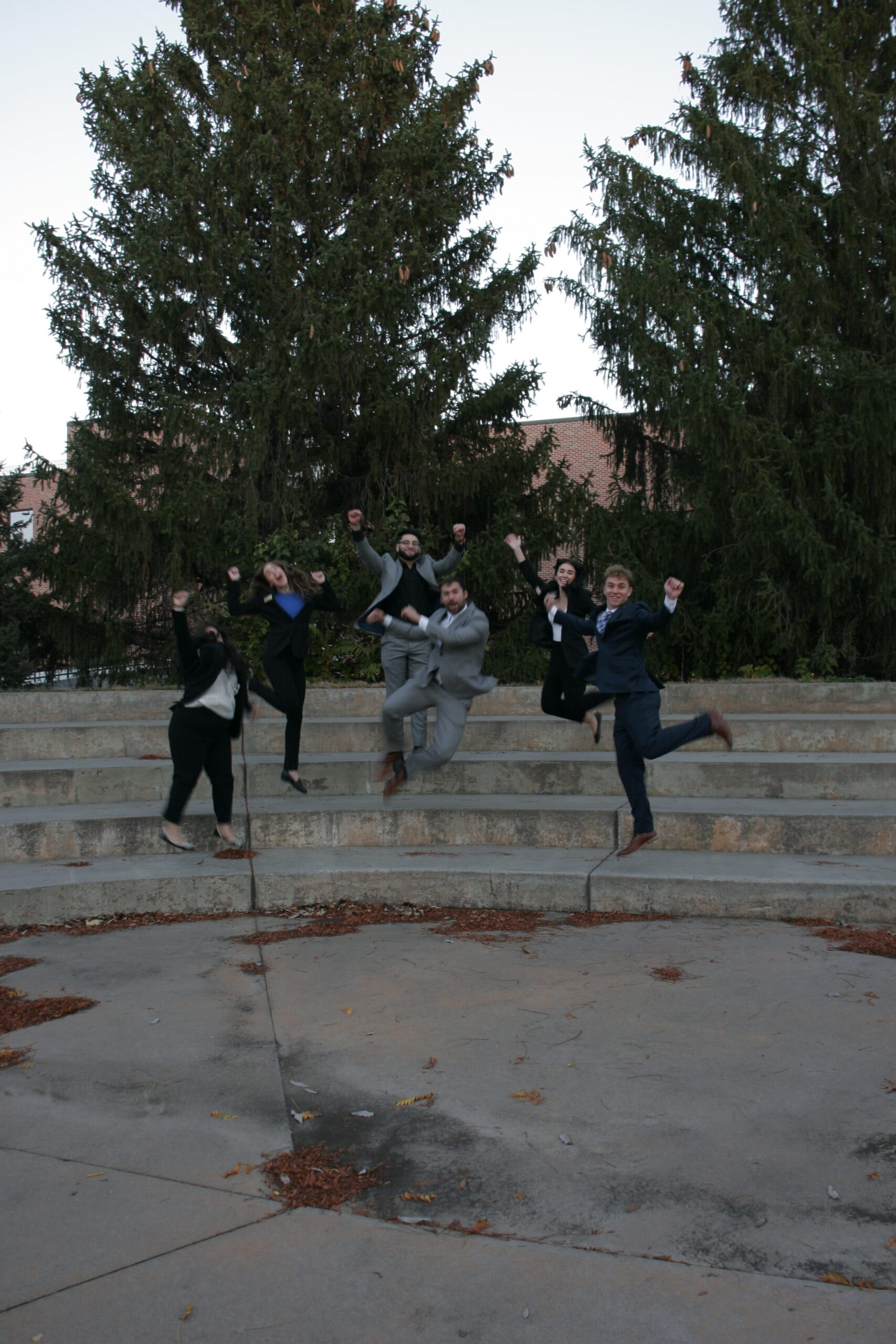 _MG_9449 UNK Student Government executive board take a silly photo of them jumping in the air at the Amphitheater.
