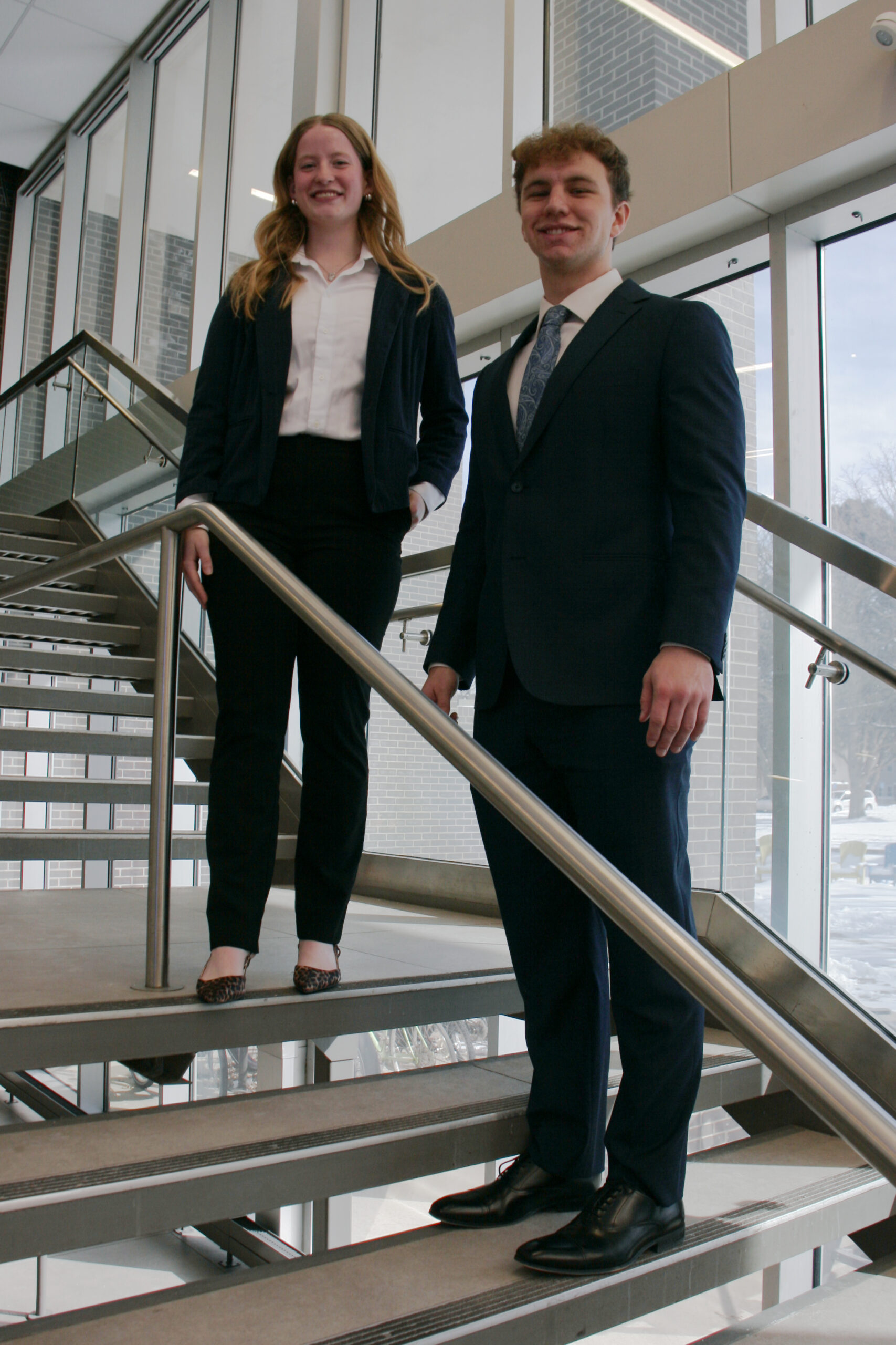 _MG_9522 Student body president Sam Schroeder and vice president Paige Oltmans pose on the Union stairs.