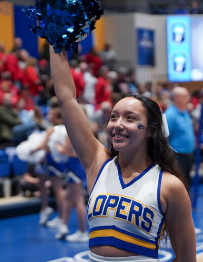 Alyanna Gonzales cheers during the volleyball game.